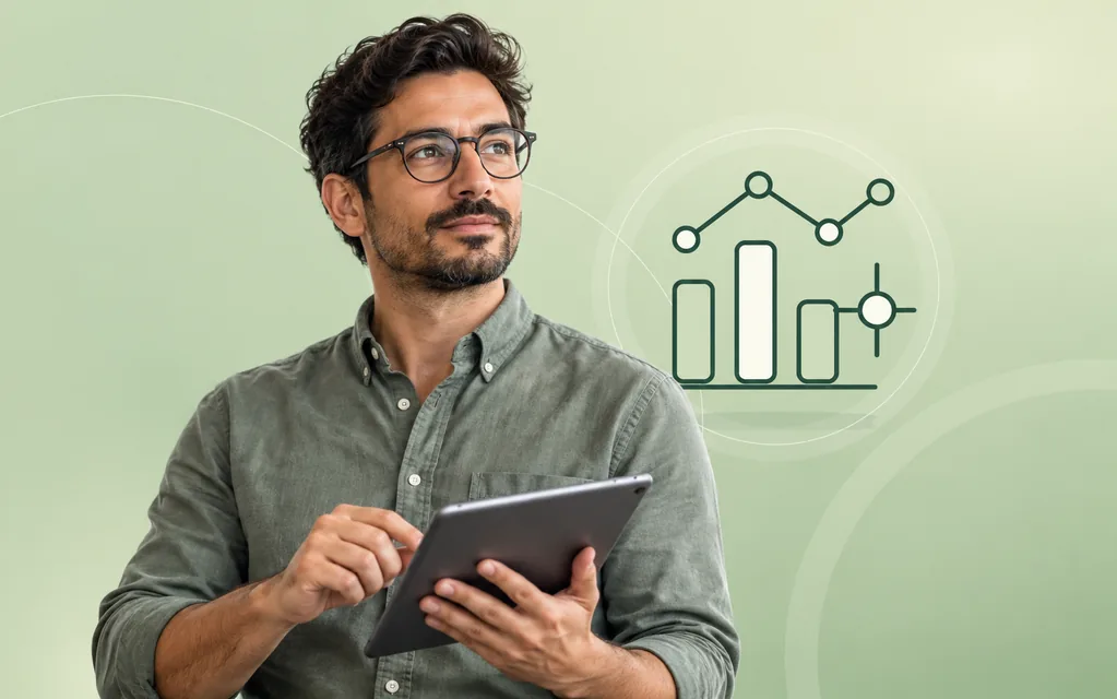 Datenanalyst mit Tablet vor grafischen Datenpunkten und Analysebalken.